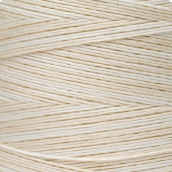 Beige thread spool on a white background