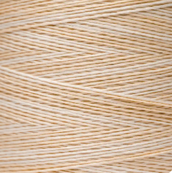 Close-up of a skein of beige thread