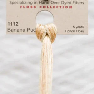 Skein of cotton floss labeled '1112 Banana Pudding'.