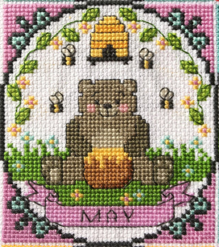 A Year Of Animal Fun & Frolics: May Cross Stitch Pattern - Crossed Hearts Needlework & Design