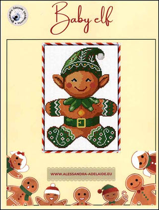 Cross-stitched Baby Elf design by Alessandra Adelaide Needleworks featuring a smiling elf in a green hat and outfit with festive red and white details, displayed with a candy-cane striped border.