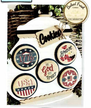 Cross stitch pattern featuring a collection of patriotic-themed cookie designs including stars, flags, and “1776,” displayed in a cookie jar arrangement by Crafty Bluebonnet Designs.