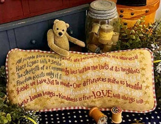 Banner of Benevolence cross stitch pattern by Silver Creek Samplers featuring inspirational sampler wording about kindness, love, compassion, and benevolence in primitive style.