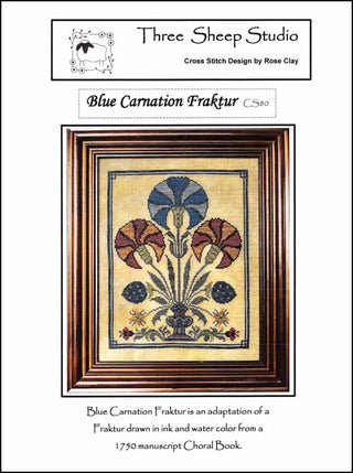 Three Sheep Studio cross stitch design for 'Blue Carnation Fraktur' with a wooden frame.
