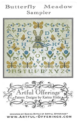 Butterfly Meadow Sampler cross-stitch pattern with alphabet and butterfly designs, featuring Artful Offerings branding.