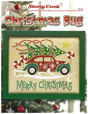 Cross-stitch design of a vintage green car decorated with snowflakes and peppermint swirls, carrying a Christmas tree on the roof with “Merry Christmas” stitched beneath — Stoney Creek Collection.