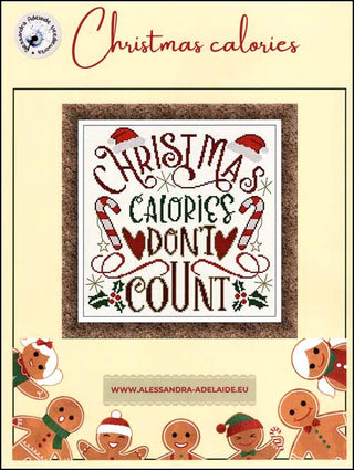 Cross-stitched Christmas design featuring swirling typography reading “Christmas Calories Don’t Count,” decorated with candy canes, Santa hats, holly, and hearts in red, green, and brown on white fabric with a festive border.