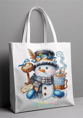 Tote bag with a snowman design featuring birds and a cup on a gray background
