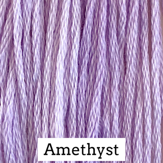 A close-up of purple Amethyst embroidery thread, with a white label at the bottom reading 'Amethyst'.