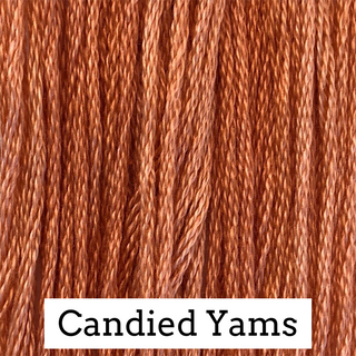 Close-up of Orange yarn labeled 'Candied Yams'