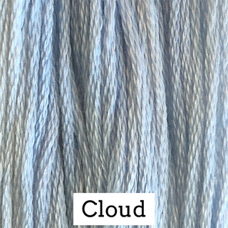 A close-up of a textured fabric or yarn swatch in a dusty light blue-gray color, with a white label at the bottom reading 'Cloud'.