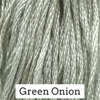Close-up of embroidery floss with 'Green Onion' label
