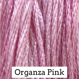 Close-up of pink embroidery floss threads with a white label at the bottom reading 'Organza Pink'.
