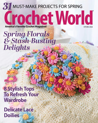 Magazine cover of Crochet World featuring a colorful crochet flower pattern.