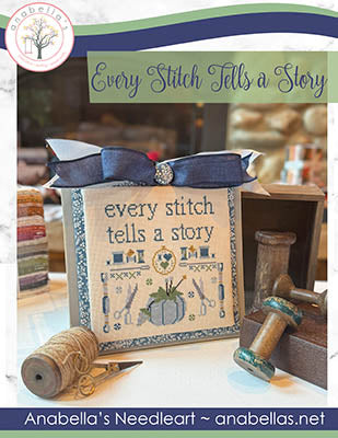 Cross stitch design featuring the phrase “Every Stitch Tells a Story” with blue florals, spools, and stitching motifs by Anabella’s.