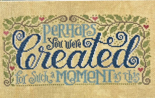 Cross-stitched text on fabric with decorative elements