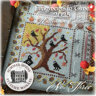 Cross-stitched pattern book titled 'Fragments in Time 2025' by Summer House Stitche Works with a tree design on the cover.