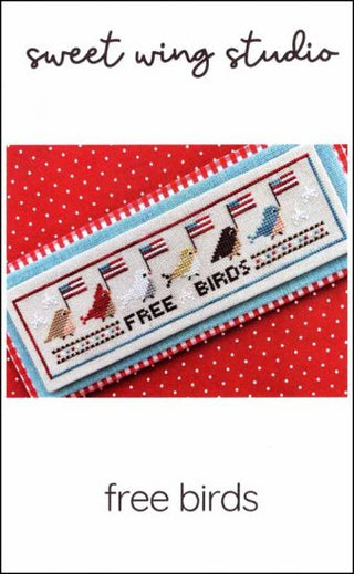 A cross stitch pattern packet for 'Free Birds' by Sweet Wing Studio, featuring a red background with white and blue birds and the text 'Sweet Wing Studio'.