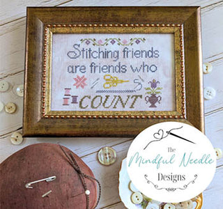 Friends Who Count cross stitch pattern by The Mindful Needle Designs featuring the phrase “Stitching friends are friends who count” with stitching motifs and decorative accents