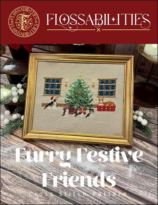 Framed cross-stitch pattern of dogs around a Christmas tree with 'Flossabilities' branding.