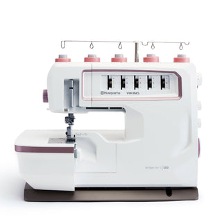 Husqvarna Viking sewing machine on a white background