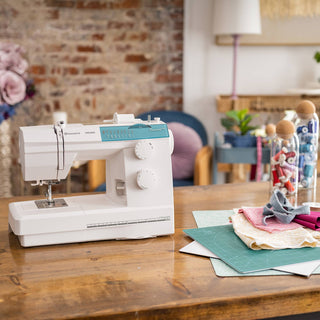 HUSQVARNA® VIKING® EMERALD™ 116 Sewing Machine in work space