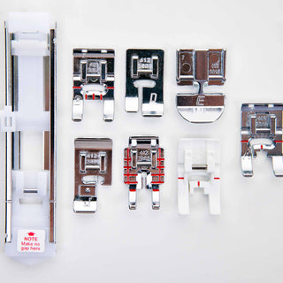 Set of sewing machine presser feet on a white background