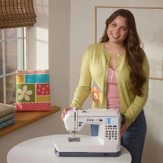 HUSQVARNA® VIKING® ONYX™ 30 – displayed on sewing workspace