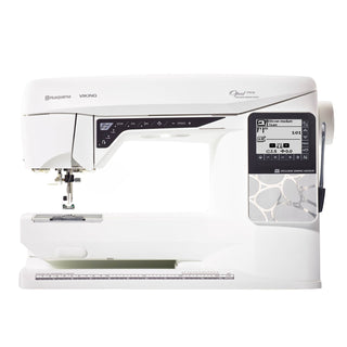 White sewing machine with digital display on a white background