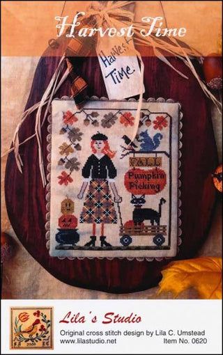Harvest Time cross stitch pattern by Lila’s Studio featuring a folk art figure with pumpkins and autumn harvest motifs in warm seasonal colors