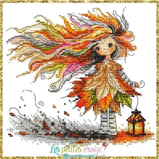 Cross-stitched design of a bohemian girl with autumn leaves and a lantern, featuring the brand 'Les Petites Croix'.