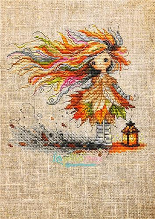 Cross-stitched design of a woman with autumn-themed hair and leaves, standing next to a lantern on a textured fabric background.