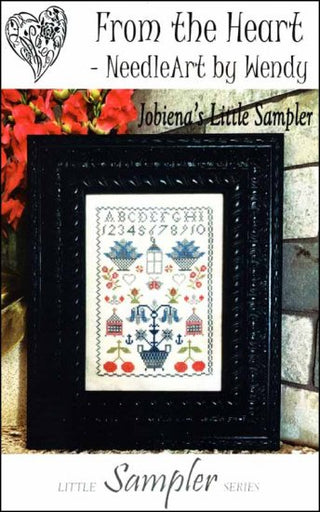Jobiena’s Little Sampler cross stitch pattern from the Little Sampler Series by From the Heart NeedleArt by Wendy. A petite traditional sampler with alphabet, numbers, and floral motifs.