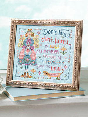 Just CrossStitch Magazine Summer 2025 Edition. Angel of the Flowers Design by Gail Bussi . Enjoy this gentle reminder to slow down and embrace every moment as this project invites you to pause and appreciate the simple yet profound beauty in everyday life.