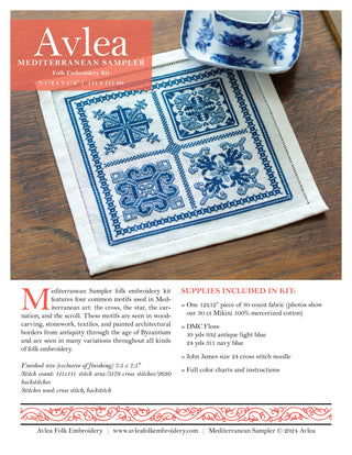 Avlea Mediterranean Sampler folk embroidery kit with blue and white design on a wooden surface
