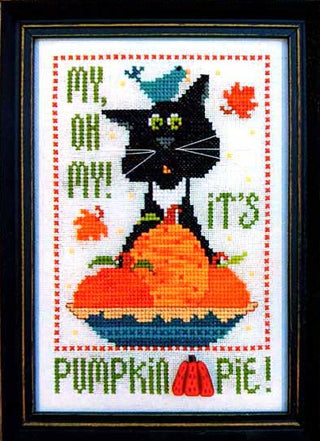 Cross-stitch design featuring a wide-eyed black cat behind stacked pumpkins in a blue pie dish, surrounded by falling autumn leaves with the phrase “my, oh my! it’s pumpkin pie!” stitched above.