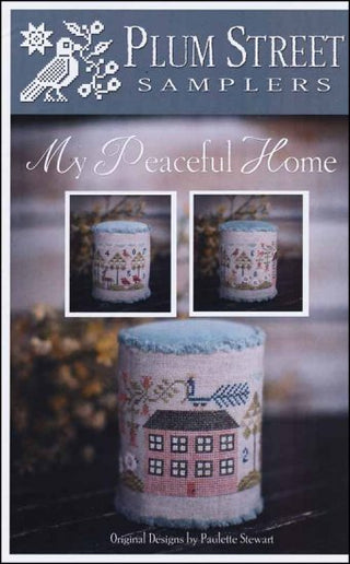 Cross Stitch pattern booklet cover with a decorated house and text 'MY PEACEFUL HOME' by Plum Street Samplers.