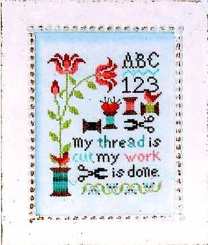 Cross stitch sampler featuring a floral vine, birds, alphabet and numbers, and the phrase “my thread is cut, my work is done” stitched in soft colors on a light background with a decorative border.
