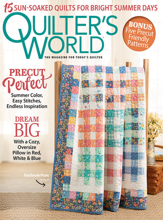 Cover of Quilter’s World Magazine Summer 2026 featuring a colorful patchwork quilt with floral and geometric patterns draped over a wooden rack, highlighting summer quilt designs and precut-friendly patterns.