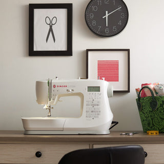SINGER® C7220 – displayed on sewing workspace