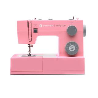 Pink Singer sewing machine on a white background