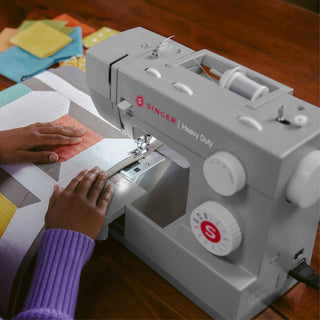 SINGER® Heavy Duty 4411 – on sewing table workspace