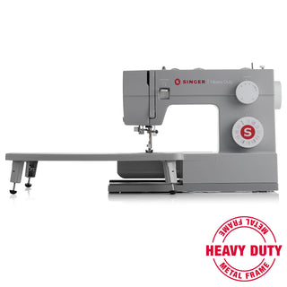 Singer heavy-duty sewing machine on a white background with 'Heavy Duty Metal Frame' label.