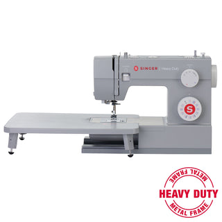 Singer heavy-duty sewing machine on a white background with 'Heavy Duty Metal Frame' label.