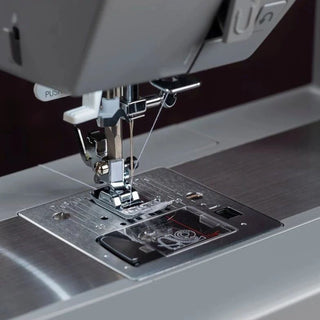 SINGER® Heavy Duty 6600C Sewing Machine - close up needle & stainless steel bedplate detail