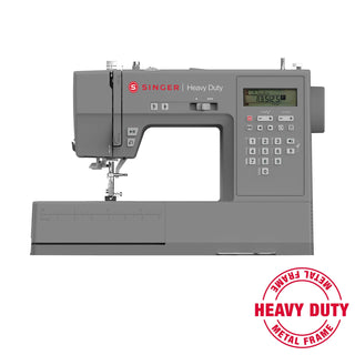 Singer heavy-duty sewing machine on a white background with 'Heavy Duty Metal Frame' stamp.