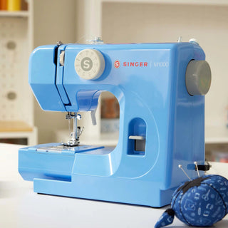 SINGER® M1000 Blue – displayed on tabletop workspace