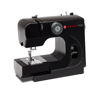 SINGER® M1000 portable sewing machine – angled view