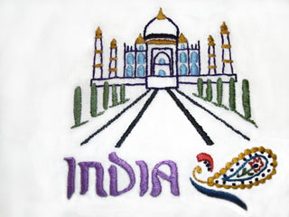 Stitcher’s Revolution SR13 Around the World iron-on embroidery transfer pattern featuring international landmarks and travel themed designs