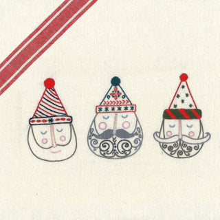 Three cartoon-like figures with colorful hats on a textured fabric background